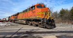 BNSF 7697 leads M370 across Diamond St.